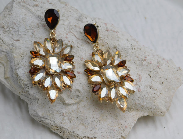 Aretes Muse dorados